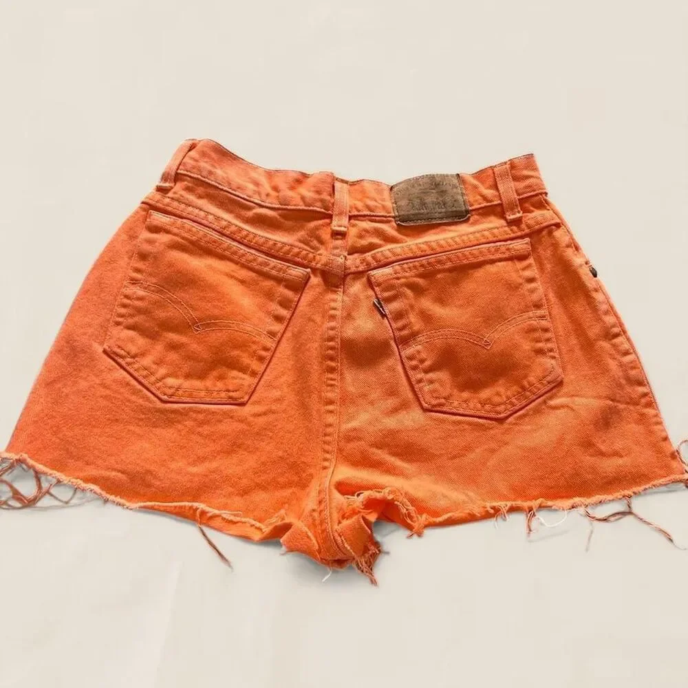 Levi’s 900 series vintage orange Jean cut off shorts | 25”